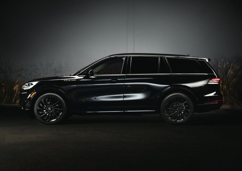 A 2024 Lincoln Aviator® SUV is shown in the Infinite Black exterior color | Apple Lincoln Apple Valley in Apple Valley MN