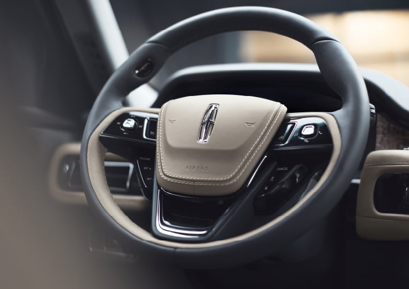 The intuitively placed controls of the steering wheel on a 2024 Lincoln Aviator® SUV | Apple Lincoln Apple Valley in Apple Valley MN
