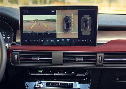 The driver of a 2024 Lincoln Corsair® SUV is shown selecting the drive mode. | Apple Lincoln Apple Valley in Apple Valley MN