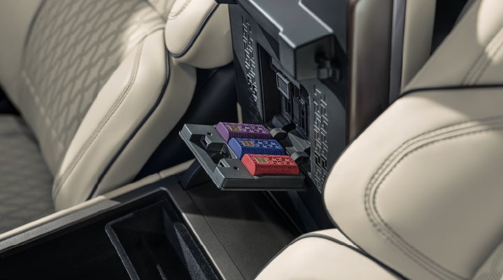 Digital Scent cartridges are shown in the diffuser located in the center arm rest. | Apple Lincoln Apple Valley in Apple Valley MN