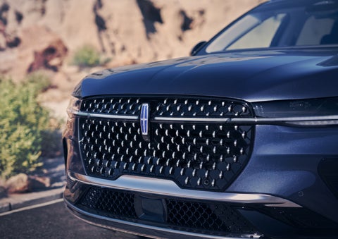 The stylish grille of a 2024 Lincoln Nautilus® SUV sparkles in the sunlight. | Apple Lincoln Apple Valley in Apple Valley MN