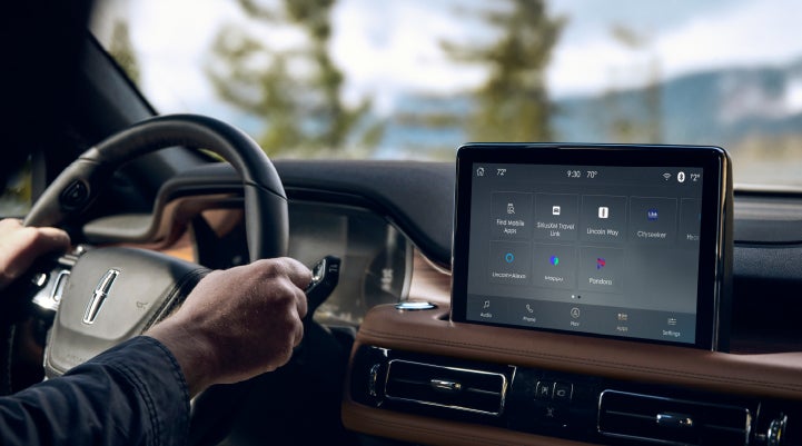The center touchscreen of a Lincoln Aviator® SUV is shown | Apple Lincoln Apple Valley in Apple Valley MN
