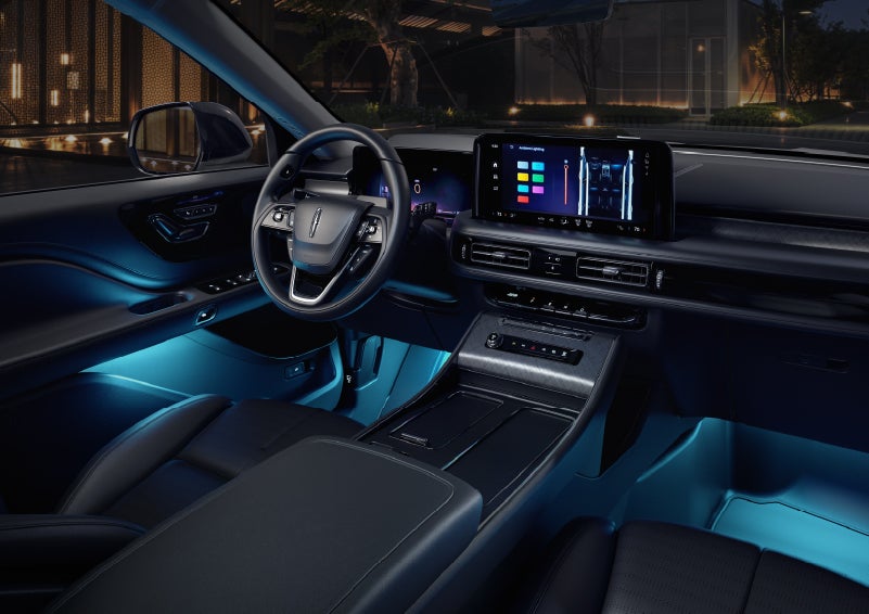Deep blue ambient lighting glows from various places within a 2026 Lincoln Aviator® SUV. | Apple Lincoln Apple Valley in Apple Valley MN