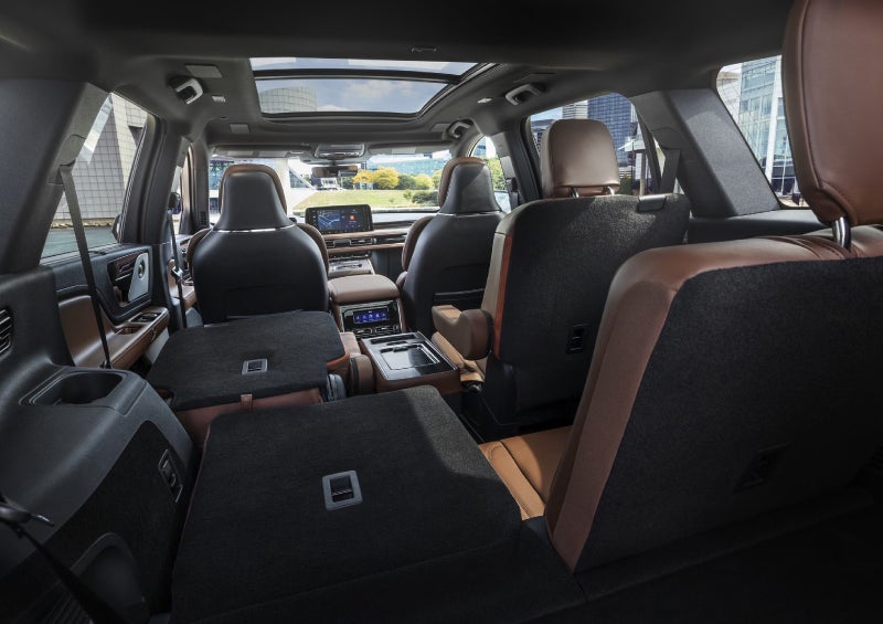 One side of the PowerFold® third-row seat and a second-row seat are folded forward in the 2026 Lincoln Aviator® SUV. | Apple Lincoln Apple Valley in Apple Valley MN