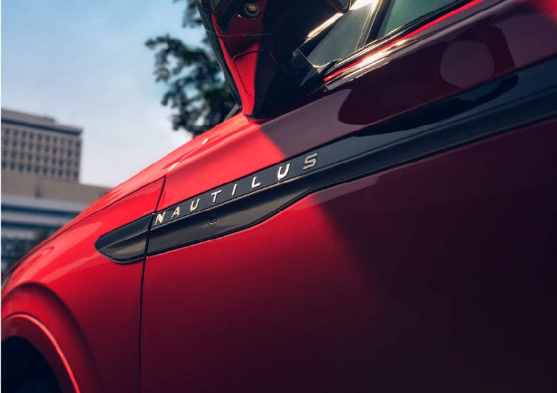 A side badge on the passenger door reads Nautilus. | Apple Lincoln Apple Valley in Apple Valley MN