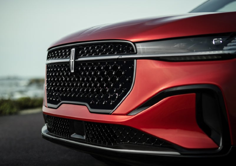The sleek grille of a 2026 Lincoln Nautilus® SUV with the available Jet Appearance Package makes a bold statement. | Apple Lincoln Apple Valley in Apple Valley MN