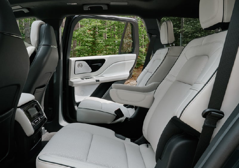 A side view of the second row with captain’s chairs in a 2027 Lincoln Aviator® Black Label™ SUV. | Apple Lincoln Apple Valley in Apple Valley MN
